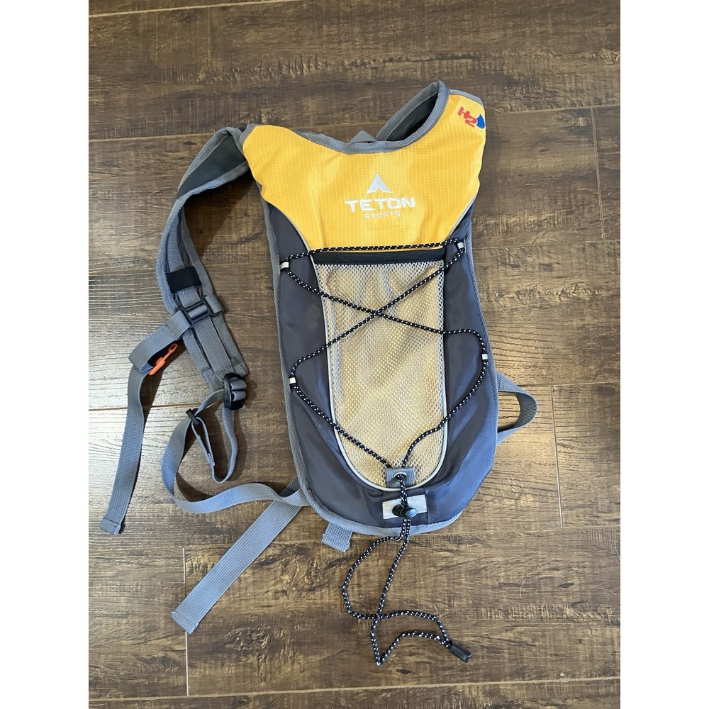 TETON Sports Hydration Backpack Yellow Gray Hiking Running Hydration Pack